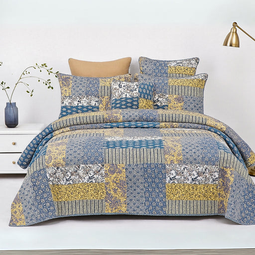 real Patchwork cotton quilt set on a bed.