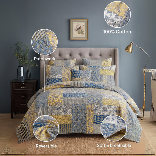 Patchwork quilt set on a bed with room details, highlighting features like patchwork and softness.