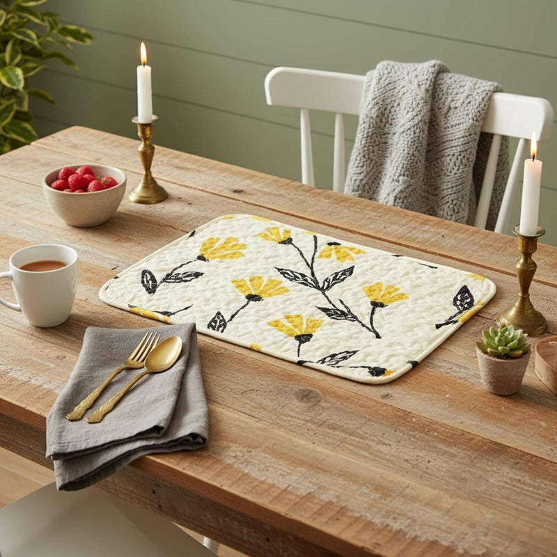 Wooden table setting with a floral placemat quilted