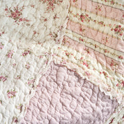 DaDalogy Cotton Patchwork Throw Blanket with floral patterns, ruffle design, and pastel pink accents, 50 x 60 inches.