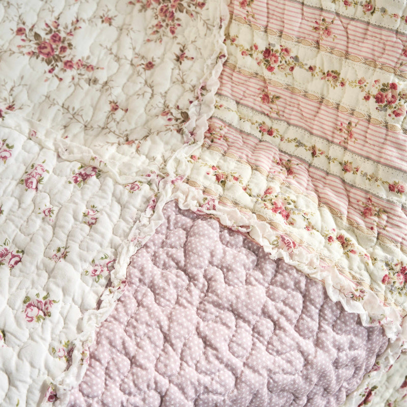 DaDalogy Cotton Patchwork Throw Blanket with floral patterns, ruffle design, and pastel pink accents, 50 x 60 inches.