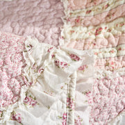 DaDalogy Cotton Patchwork Throw Blanket with floral ruffle design in blush pink and cream tones, showcasing shabby chic vintage style.