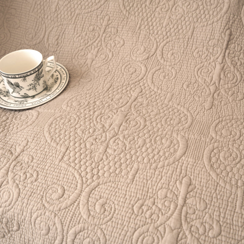 DaDa Bedding Elegant Fringed Cotton Quilted Throw Blanket - Luxurious Solid Soft Paisley Pattern, Cozy Lightweight Lap Throw, Perfect for Couch or Bed, Neutral Sandy Taupe Tan Beige, 50x60 Inches - DaDa Bedding Collection