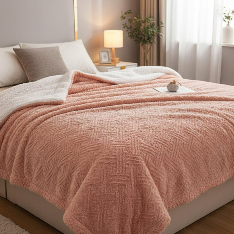 Soft reversible fleece and sherpa throw blanket in coral peach and white for couch or bed