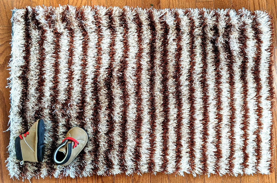 a close up of a pair of shoes on a skateboard 