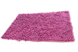 A pink chenille cotton shag bathroom rug measuring 16x24 inches. The rug is plush and fluffy, with an anti-slip backing to prevent slips and falls in the shower or tub. It is an absorbent bath mat that quickly soaks up water to keep bathroom floors dry. The rug is machine washable and resistant to water and stains. It is a small, soft, and super comfortable rug that adds a girly touch to any bathroom decor.